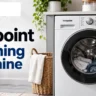 Modern Hotpoint washing machine in a UK laundry room